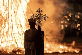 An image of a high priest holds a cross during the celebrations of the Ethiopian Orthodox holiday of Meskel in Addis Ababa in September 2023